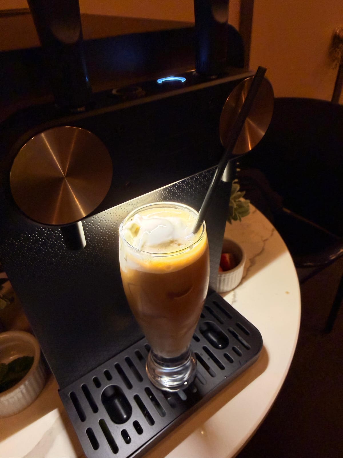 A nitro cold brew coffee float with a creamy cascading head